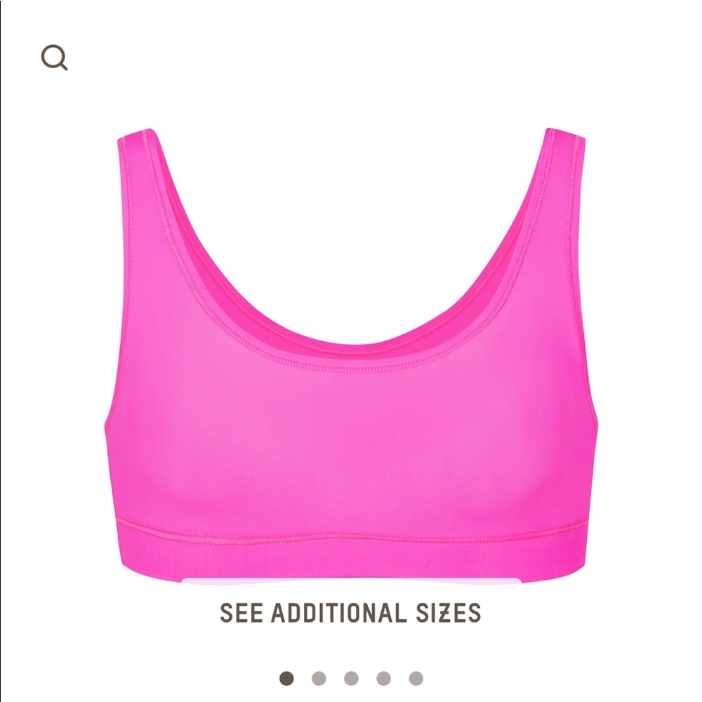 Neon pink SKIMS bralette